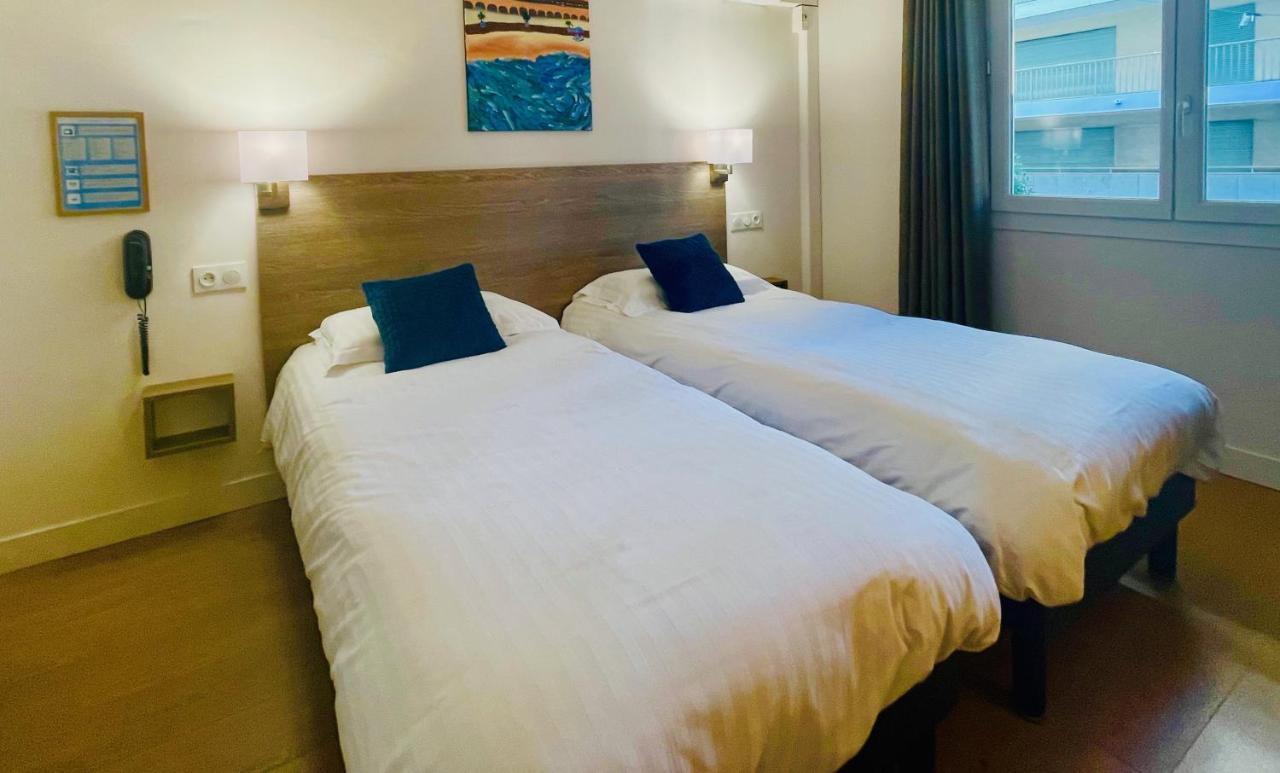 Hotel Courbet Juan-les-Pins Bagian luar foto