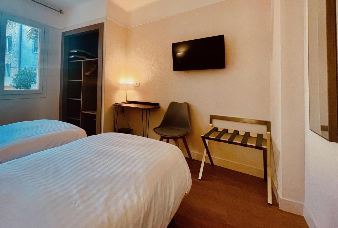 Hotel Courbet Juan-les-Pins Bagian luar foto