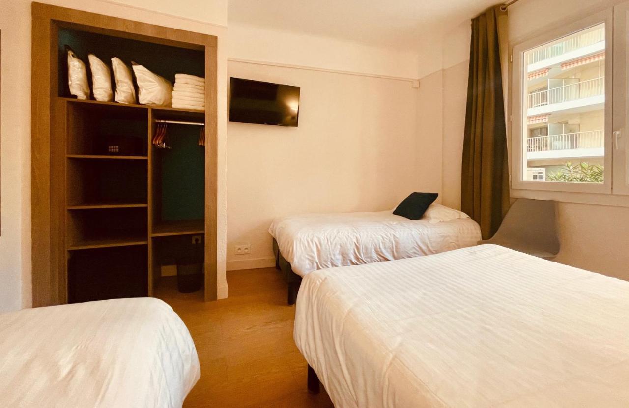 Hotel Courbet Juan-les-Pins Bagian luar foto