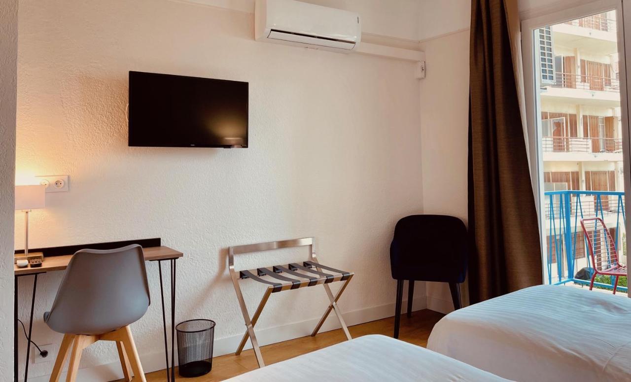 Hotel Courbet Juan-les-Pins Bagian luar foto