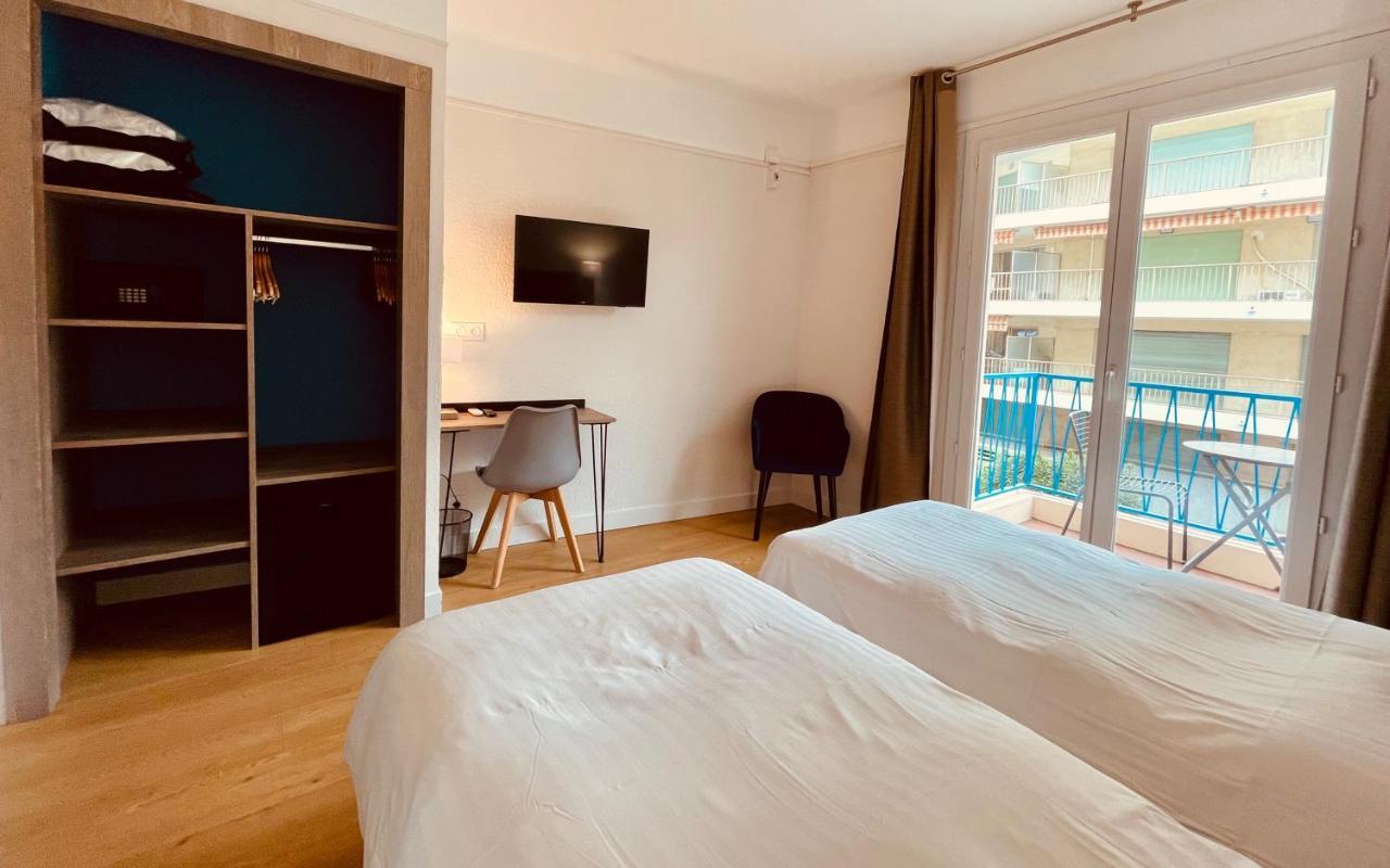 Hotel Courbet Juan-les-Pins Bagian luar foto