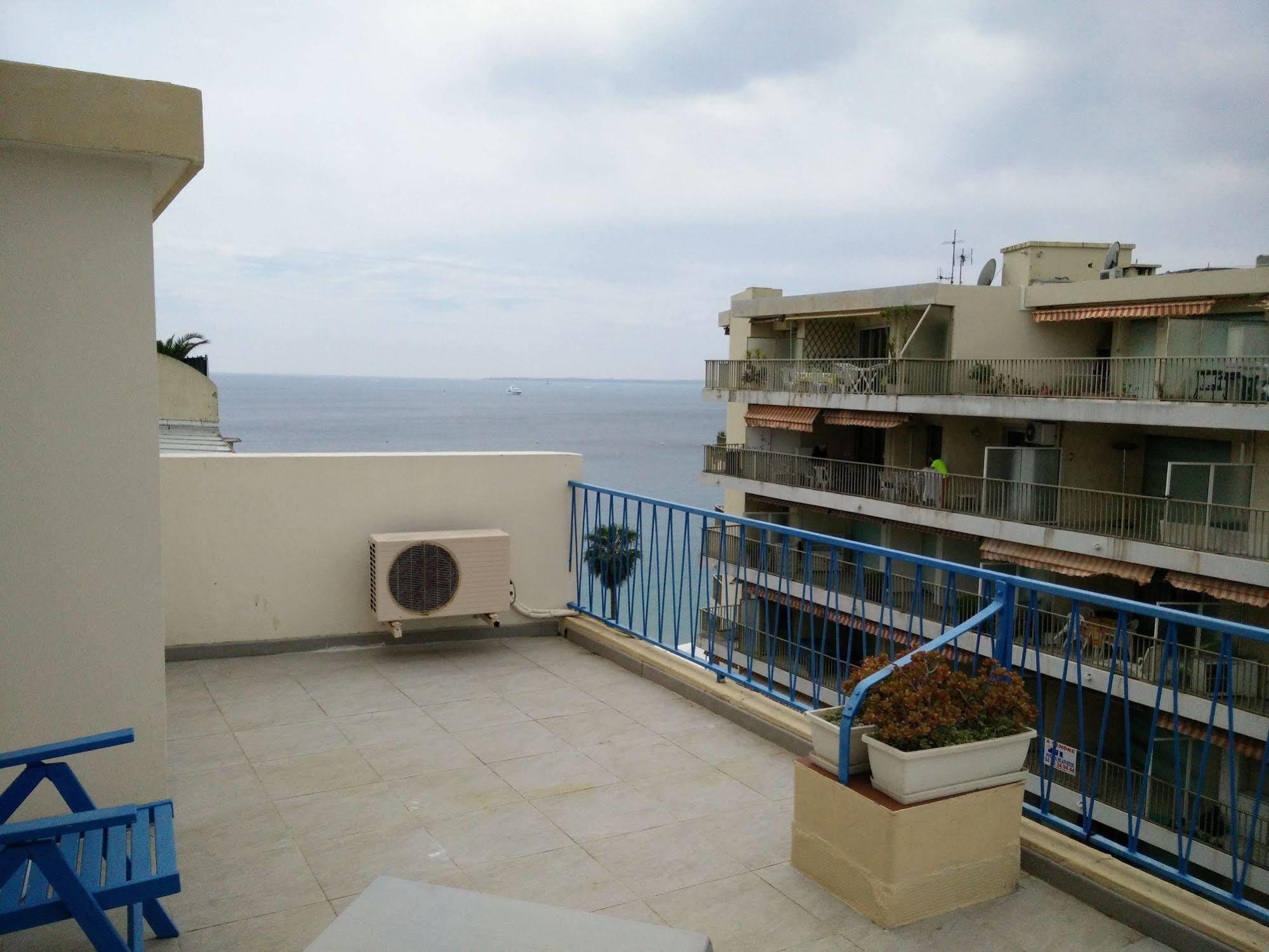 Hotel Courbet Juan-les-Pins Bagian luar foto